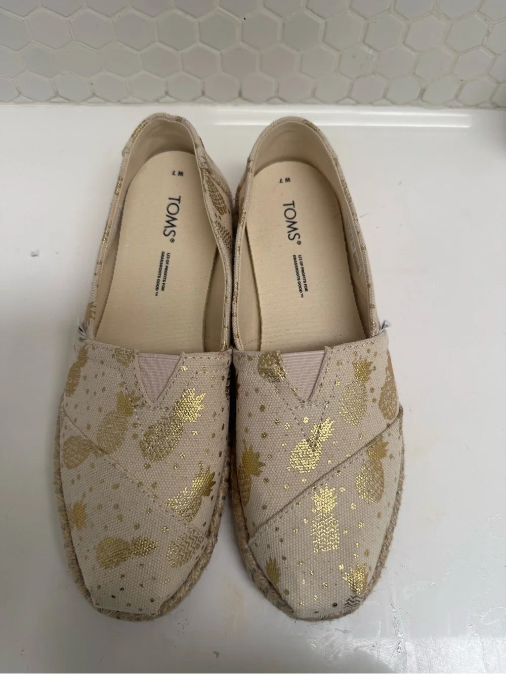TOMS Cream Espadrille Slip-Ons with Metallic Gold Pineapple Motif